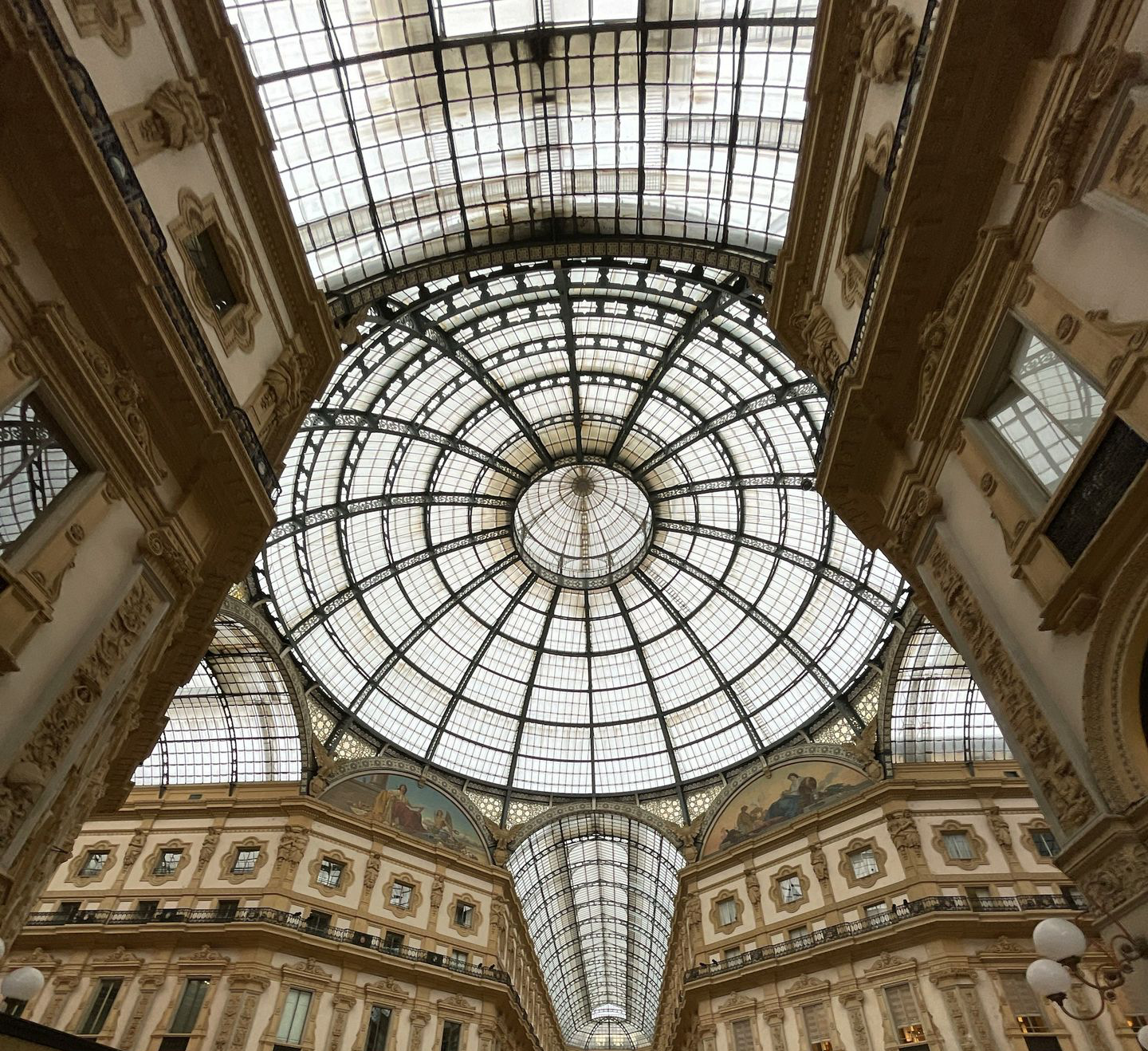 a large group of people inside a large building with Galleria Vittorio Emanuele II in the background